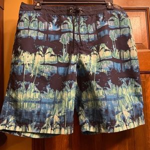 NWT Men’s Blue Patterned Swim Trunks.  Size L.
